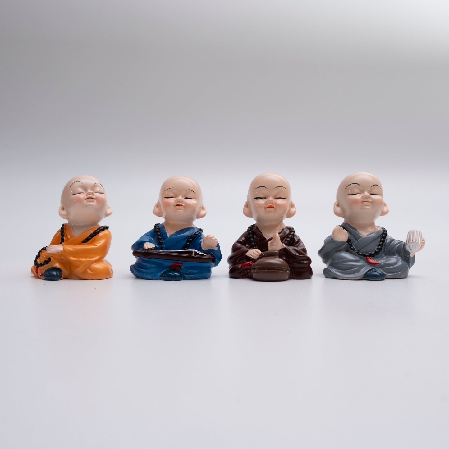 Set of 4 Buddha Monk Figurines – Adorable Resin Miniatures for Home & Car Décor