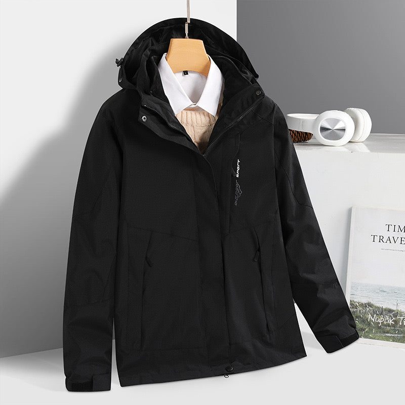 A versatile and stylish winter jacket for men featuring a three-in-one detachable design with a windproof and waterproof outer shell and a cozy fleece lining. Perfect for adventurers, students, and tourists, it includes adjustable cuffs, a detachable hood, a drawstring waist, and multiple pockets for functionality and comfort in harsh winter conditions.