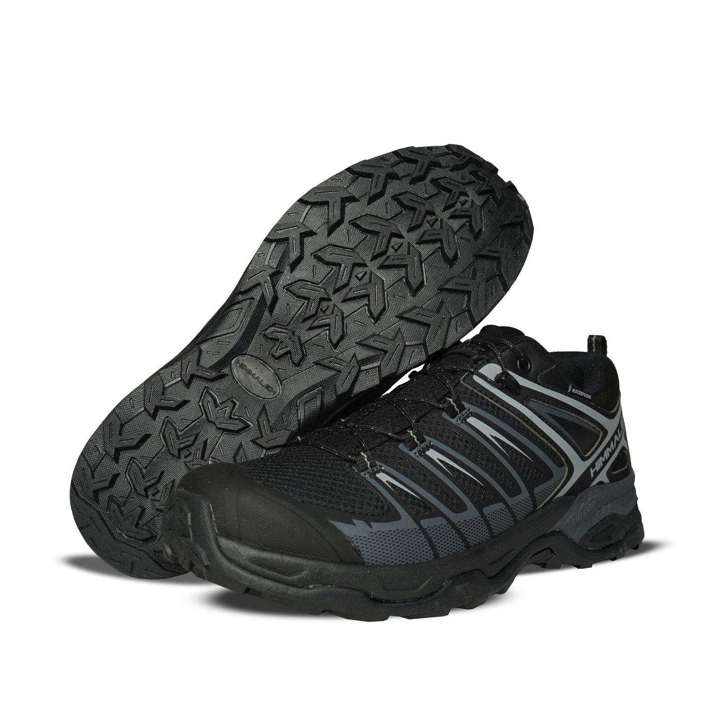 A pair of lightweight, multi-purpose hiking shoes featuring a durable toe cap, waterproof breathable membrane, and non-slip rubber outsole with 5mm gripping studs, designed for excellent cushioning and grip on various walking trails.