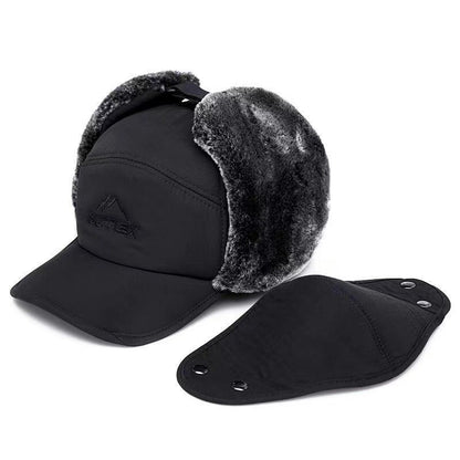 A rugged Himalayan Extreme Winter Cap featuring thick fur ear protectors and an adjustable chin strap, displayed against a snowy mountain backdrop. The cap showcases a stylish design in a deep navy color, emphasizing its durability and warmth for extreme winter conditions.