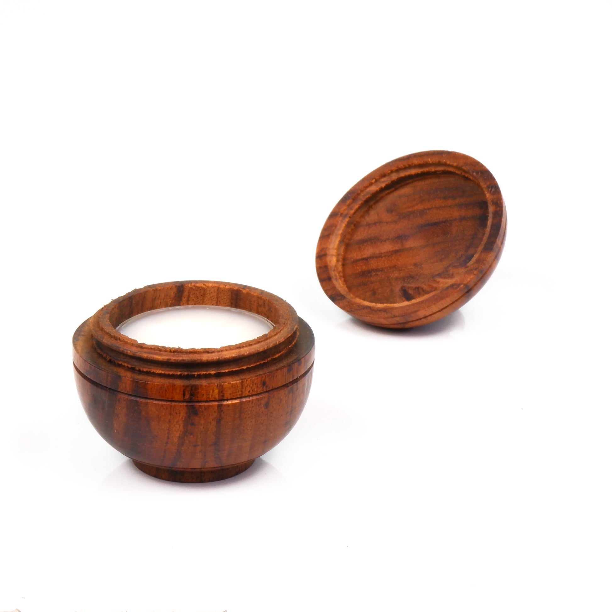 Natural solid perfume in the rosewood round container